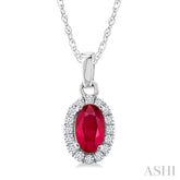 5x3 MM Oval Shape Ruby and 1/20 Ctw Round Cut Diamond Halo Precious Pendant with Chain in 14K White Gold