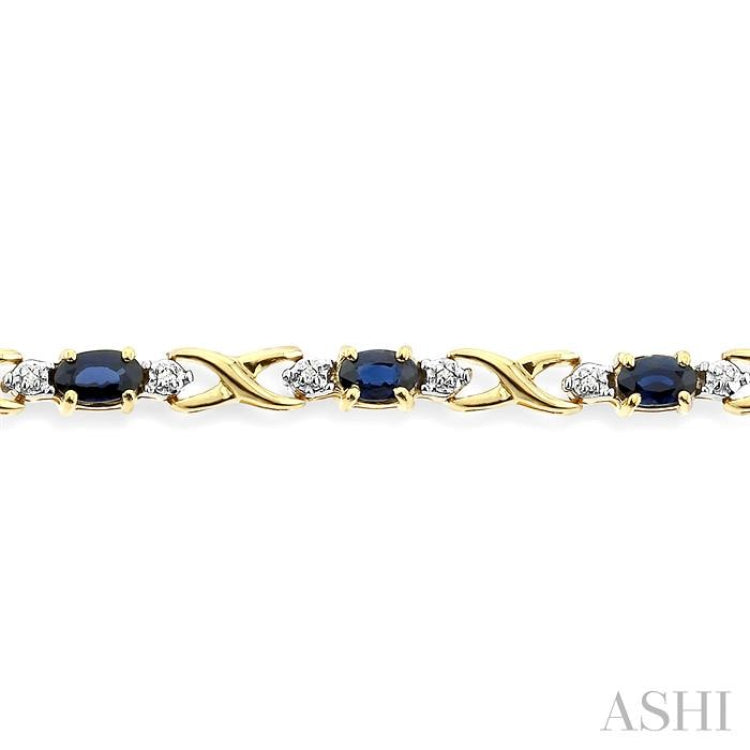 5x3 MM Oval Cut Sapphire and 1/10 Ctw Round Cut Diamond Bracelet in 10K Yellow Gold