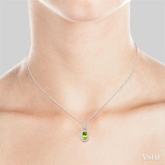 5x3 MM Oval Shape Peridot and 1/20 Ctw Round Cut Diamond Halo Semi-Precious Pendant with Chain in 10K White Gold