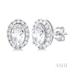 5x3 MM Oval Shape White Topaz and 1/8 Ctw Single Cut Diamond Halo Semi-Precious Stud Earrings in 10K White Gold