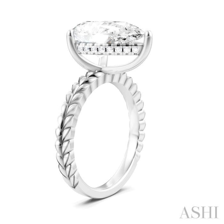 1/8 Ctw Pear Shape Round Cut Diamond Semi-Mount Engagement Ring in 14K White Gold