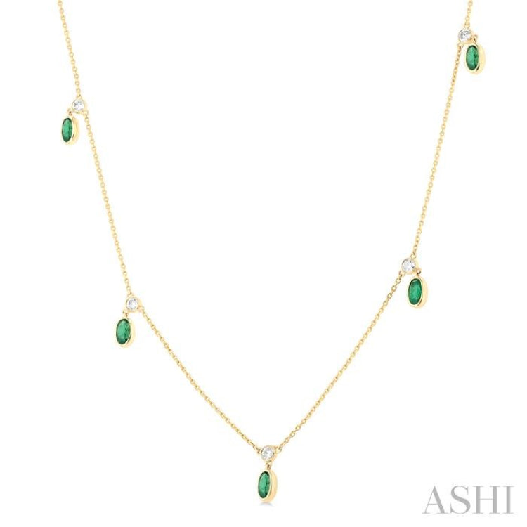 5x3 MM Oval Shape Emerald and 1/4 Ctw Round Cut Diamonds Precious Station Necklace in 14K Yellow Gold