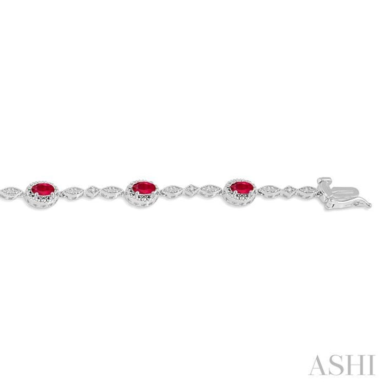 5x3 MM Oval Cut Ruby and 1/20 Ctw Round Cut Diamond Bracelet in 10K White Gold