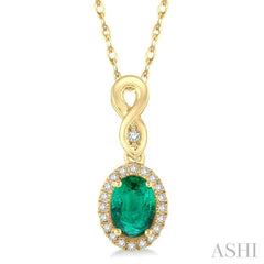 6x4 MM Oval Cut Emerald and 1/10 ctw Round Cut Diamond Pendant in 10K Yellow Gold with Chain