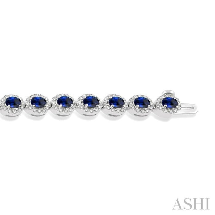 1 Ctw Round Cut Diamond & 4x3 MM Oval Cut Sapphire Precious Bracelet in 14K White Gold