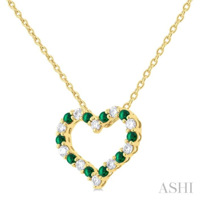 1.4 MM Round Cut Emerald and 1/8 ctw Open Heart Round Cut Diamond Precious Fashion Pendant With Chain in 14K Yellow Gold