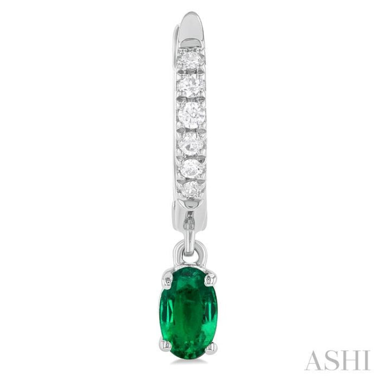5x3 MM Oval Cut Emerald and 1/8 Ctw Petite Round Cut Diamond Precious Fashion Huggies in 10K White Gold