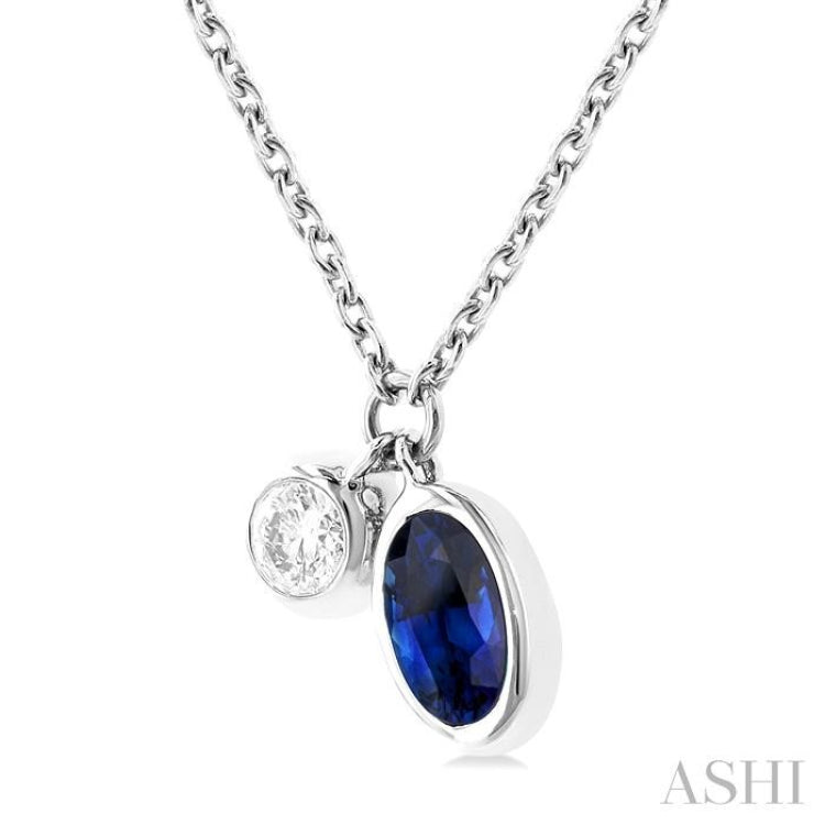 1/50 ctw Oval Cut 5X3MM sapphire and Bezel Set Round Cut Diamond Precious Necklace in 10K White Gold