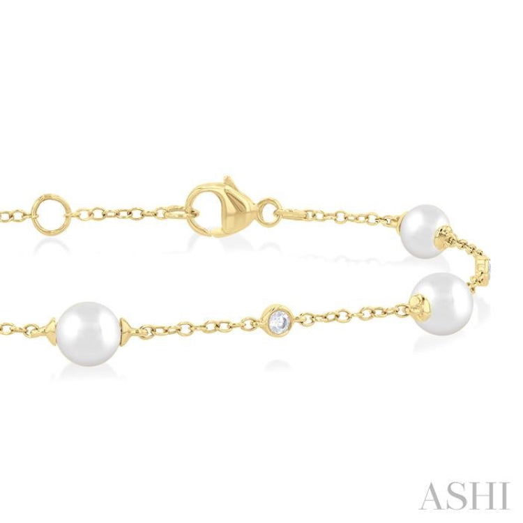 5 MM Round Shape Cultured Pearl and 1/6 ctw Round Cut Diamond Fashion Station Bracelet in 14K Yellow Gold