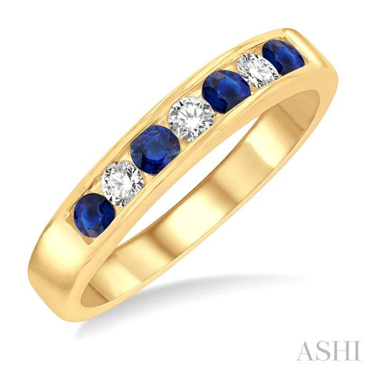 2.5 MM Round Cut Sapphire and 1/5 ctw Channel Set Round Cut Diamond Band in 14K Yellow Gold