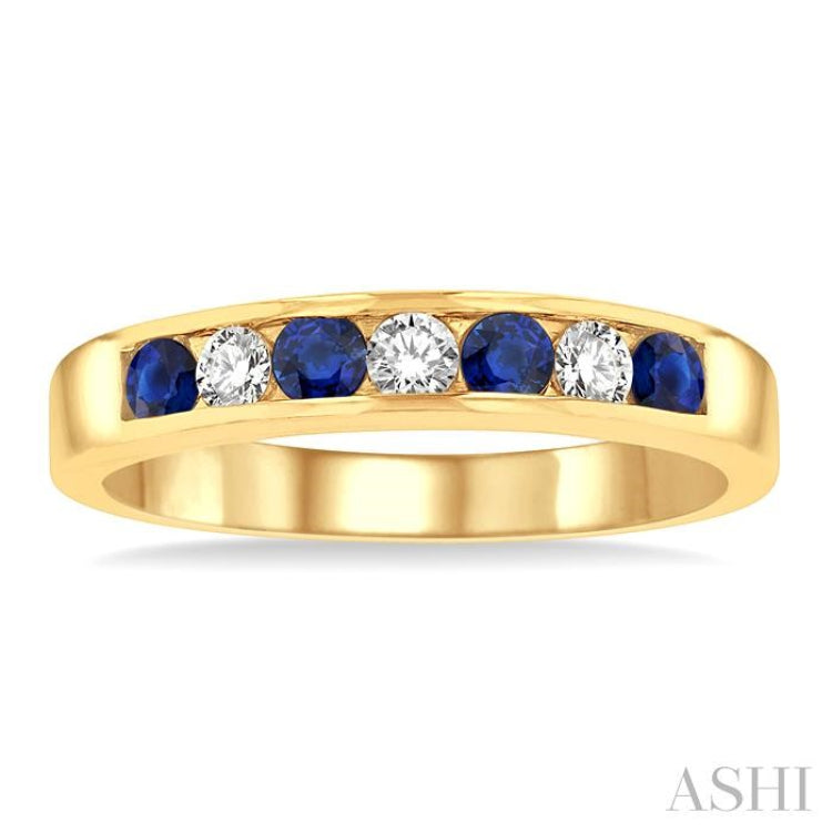 2.5 MM Round Cut Sapphire and 1/5 ctw Channel Set Round Cut Diamond Band in 14K Yellow Gold