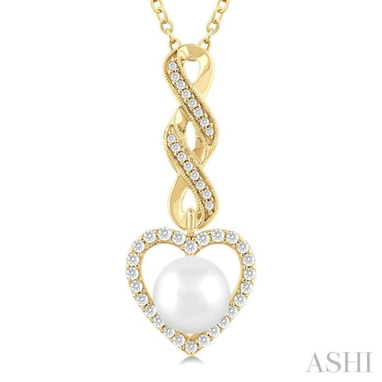 7 MM Round Shape Cultured Pearl and 1/4 Ctw Heart Frame Round Cut Diamond Fashion Pendant With Chain in 10K Yellow Gold