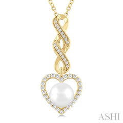 7 MM Round Shape Cultured Pearl and 1/4 Ctw Heart Frame Round Cut Diamond Fashion Pendant With Chain in 10K Yellow Gold